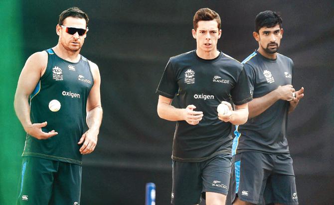 New Zealand bowlers Nathan McCullum (left), Mitchell Santner and Ish Sodhi (right) are all set to roll their arms during a practice session at Feroz Shah Kotla in New Delhi yesterday