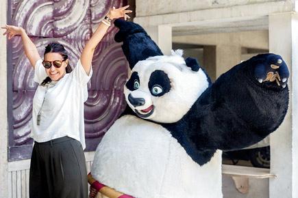 Neha Dhupia poses with Kung Fu Panda
