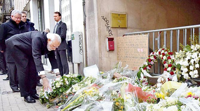 Prime Minister Narendra Modi pays tribute to the victims of the Brussels terror attacks in which over 30 people, including an Indian, lost their lives due to "mindless violence". Pic/PTI