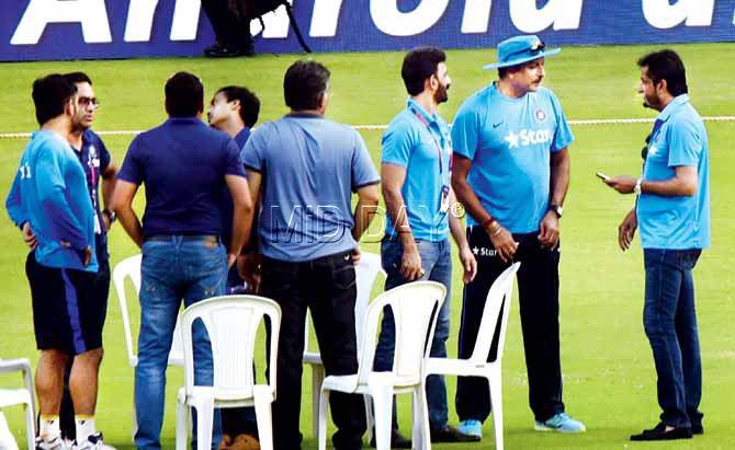 Chairman of selectors Sandeep Patil (extreme right) chats with Team Director Ravi Shastri and North Zone selector Vikram Rathore (to Shastri