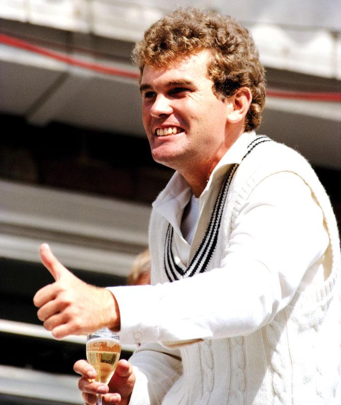 Martin Crowe celebrates with a glass of champagne after the Kiwis record their first Test win over England at Headingley in 1983. Pic/Getty Images