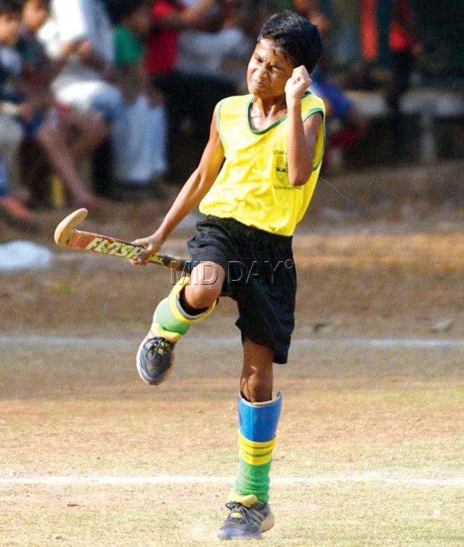 Zeal Michael of St Stanislaus is ecstatic after scoring against Don Bosco (Matunga) in the MSSA U-10 inter-school hockey final yesterday