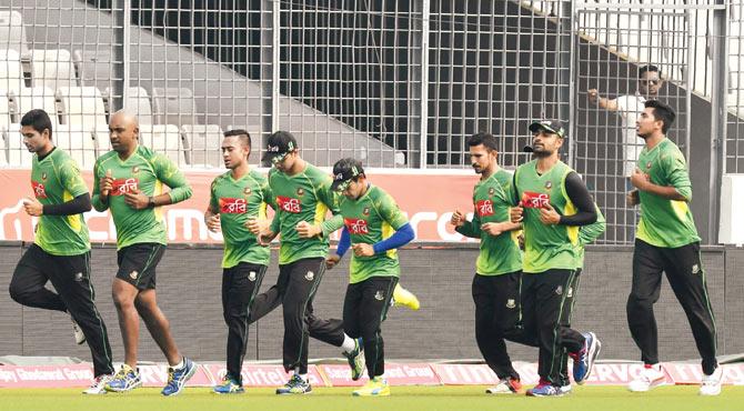 Bangladesh players warm up during a practice session on eve of the Asia Cup final against India at Sher-e-Bangla National Stadium in Mirpur on Saturday. Pic/AFP