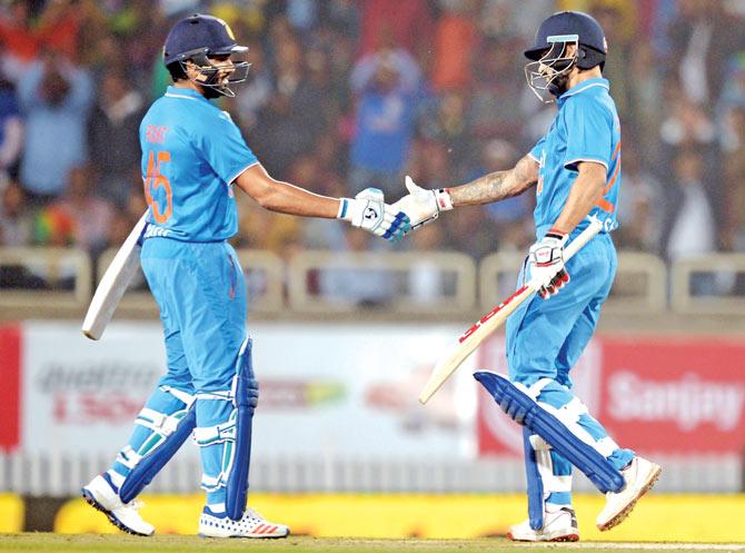 India openers Rohit Sharma (left) and Shikhar Dhawan during their 75-run stand in second Twenty20 international against Sri Lanka in Ranchi last month. Pics/AFP