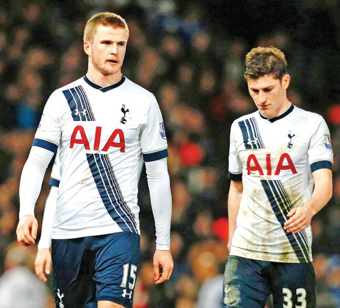 Tottenham players Ben Davies (right) and Eric Dier react after the final whistle. Pics/AFP