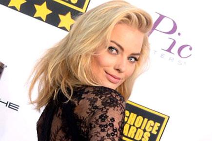 Margot Robbie is 'dying' to see 'Suicide Squad'