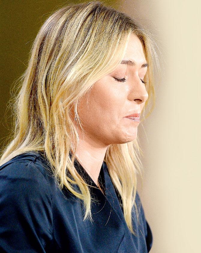 Maria Sharapova reacts as she addresses the media about her failed drug test in Los Angeles on Monday. Pic/AFP