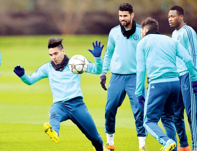 Preparing for homestretch Chelsea striker Radamel Falcao (left) takes part in a training session in London on the eve of tonight