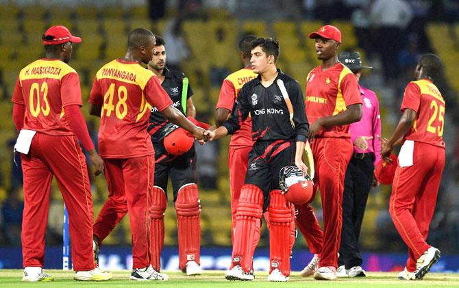 Zimbabwe players celebrate thier victory against Hongkong during their ICC T20 World cup match in Nagpur. Pic/PTI