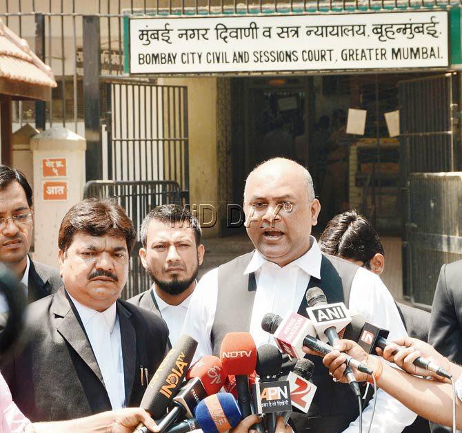 Defence lawyer Abdul Wahab Khan (right) and advocate Sharif Shaikh interact with the media after the conviction. Pics/Satej Shinde
