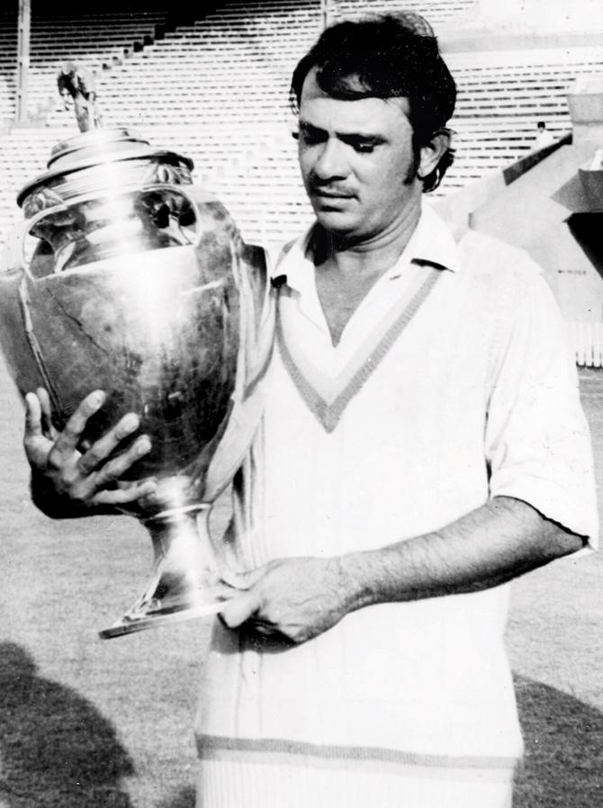 Mumbai captain Ashok Mankad poses with 1975-76 Ranji Trophy. Pic/mid-day archives 