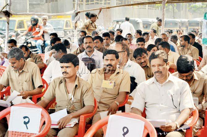 Auto drivers await their turn for the Marathi proficiency test at the Wadala RTO on Tuesday 