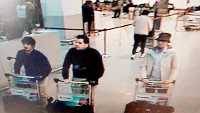 CCTV camera footage shows three men who are suspected of taking part in the attacks at Belgium’s Zaventem Airport. Pic/AFP