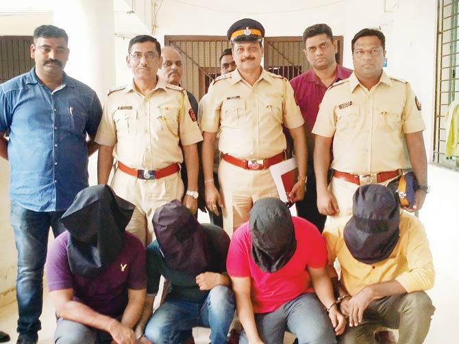 Charkop police with the quartet they nabbed last morning from Dahisar check naka