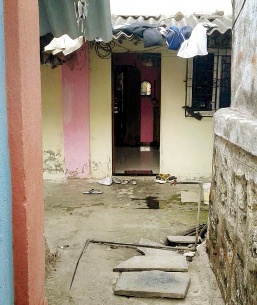 The room in Kasarvadavali where the constable and his family live. The daughter was awake and said she saw two robbers run away