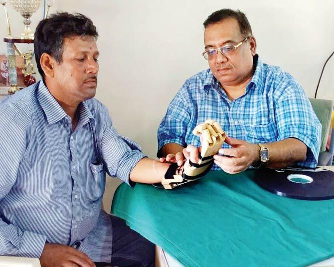 Rajesh Ojha with Dr Mukesh Joshi at Kutchh’s Jaya Rehabilitation Centre and Research Institute  where he was fitted with the prosthetic