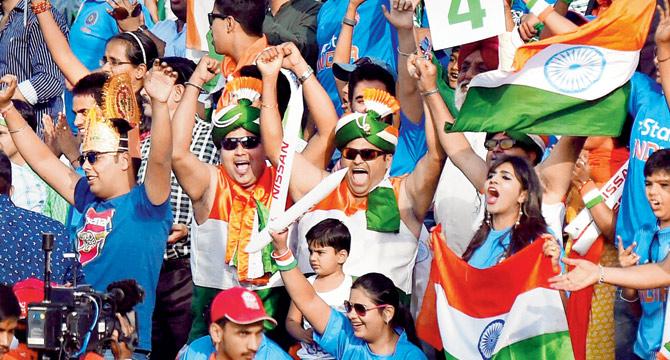 Fans cheer the Indian women