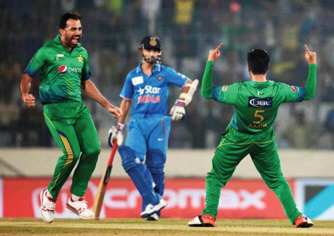 A moment from Asia Cup Twenty20 match between India and Pakistan in Dhaka on February 27. Pic/AP