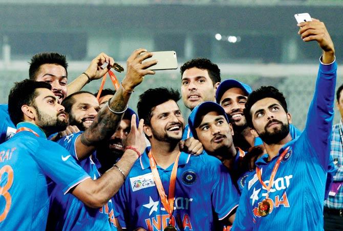 Indian team is selfie sharp after the Asia Cup win. Pic/AFP