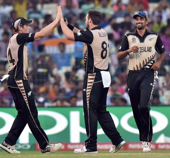  New Zealand cricketers celebrate a wicket during World T20 match against Bangladesh at Eden Garden in Kolkata on Saturday.