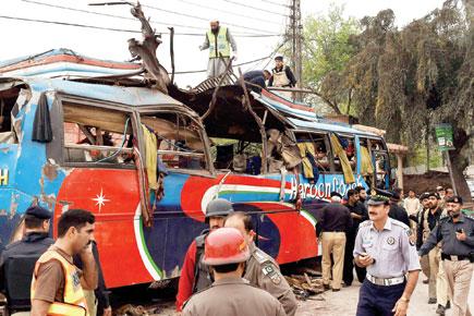 Vendetta bomb blast on bus kills 16 Pakistan govt employees