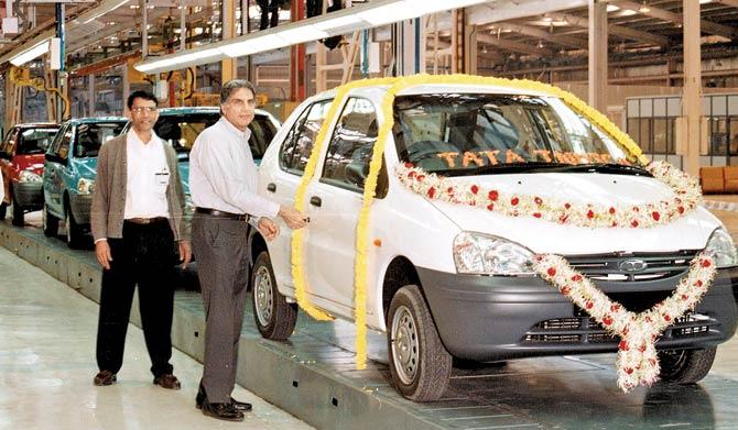 Ratan Tata with the first Indica off the assembly line