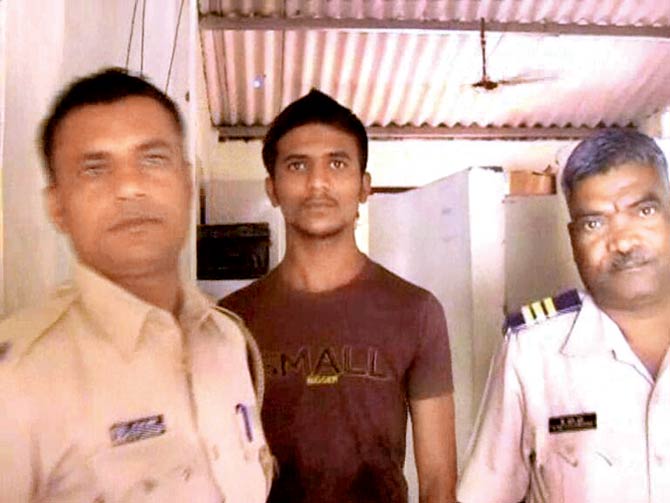 Sagar Dinkar (centre) says now that he has succeeded in murdering his father and his girlfriend, the police can do whatever they want