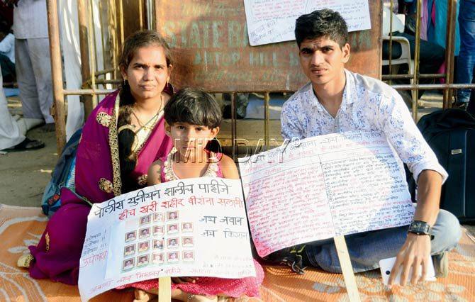 Siddhant Bagul (right), a 21-year-old BPharm student and member of the group, with constable Pramod Patil’s wife, Yashashree, and their four-year-old daughter, who have been on a dharna at Azad Maidan since Wednesday, demanding an end to harassment within the police ranks. Pic/Bipin Kokate