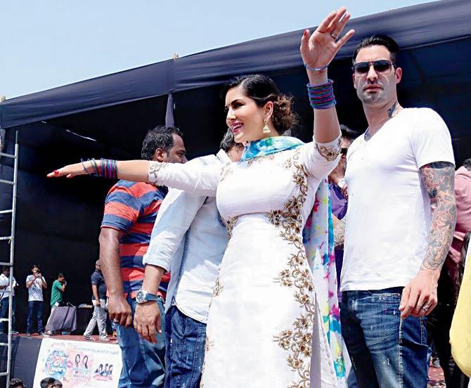Sunny Leone performed at the event in Surat later on. Her husband Daniel Weber (right) said they did not take action against the organisers as they were college students