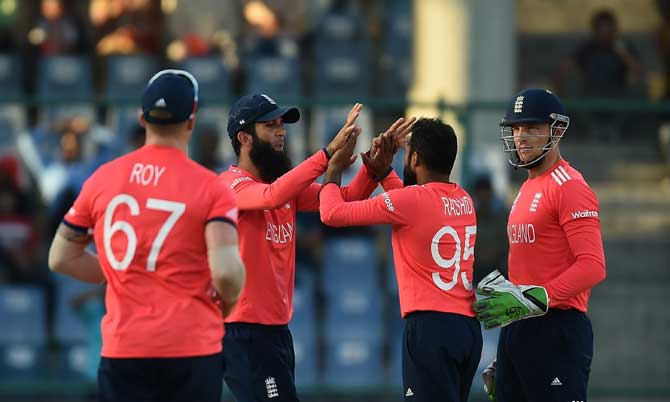England celebrates the fall of an Afghanistan wicket