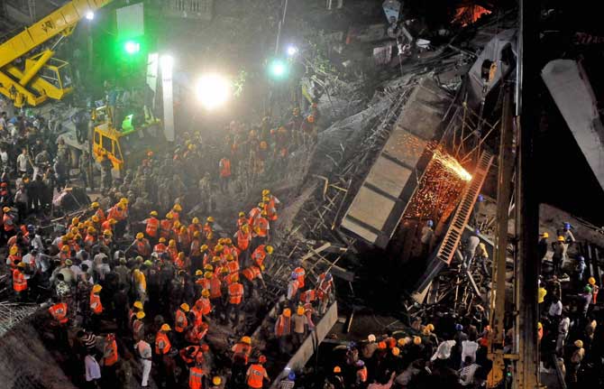  Rescue work is going on after an under construction flyover collapsed in Vivekananda Road, in Kolkata on Thursday.