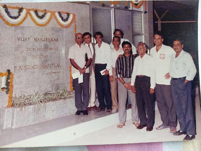 Dilip Pradhan (extreme right), Hemant Waingankar, NV Bandekar, Anil Joshi, Ramesh Kosambia, Ravi Savant (partly hidden), Bal Mahadalkar, Suresh Trivedi (of Sungrace Mafatlal)  and Mumbai Cricket Association president Madhav Mantri at the opening ceremony of the Vijay Manjrekar dressing rooms sponsored by  Sungrace Mafatlal in 1991.