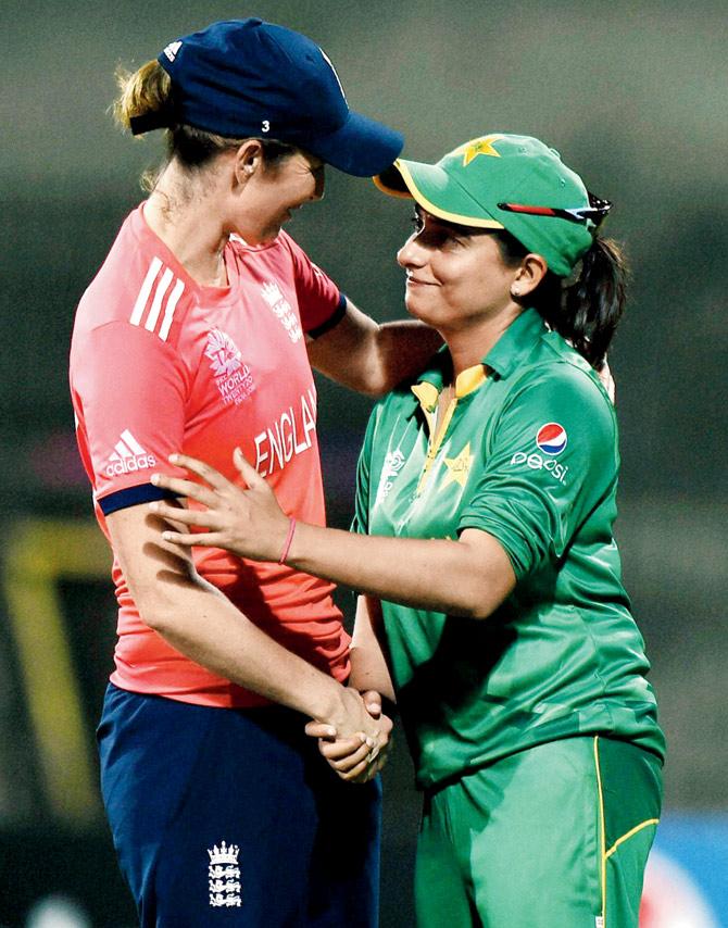 England skipper Charlotte Edwards with her Pakistan counterpart Sana Mir (right) in Chennai yesterday. Pic/PTI