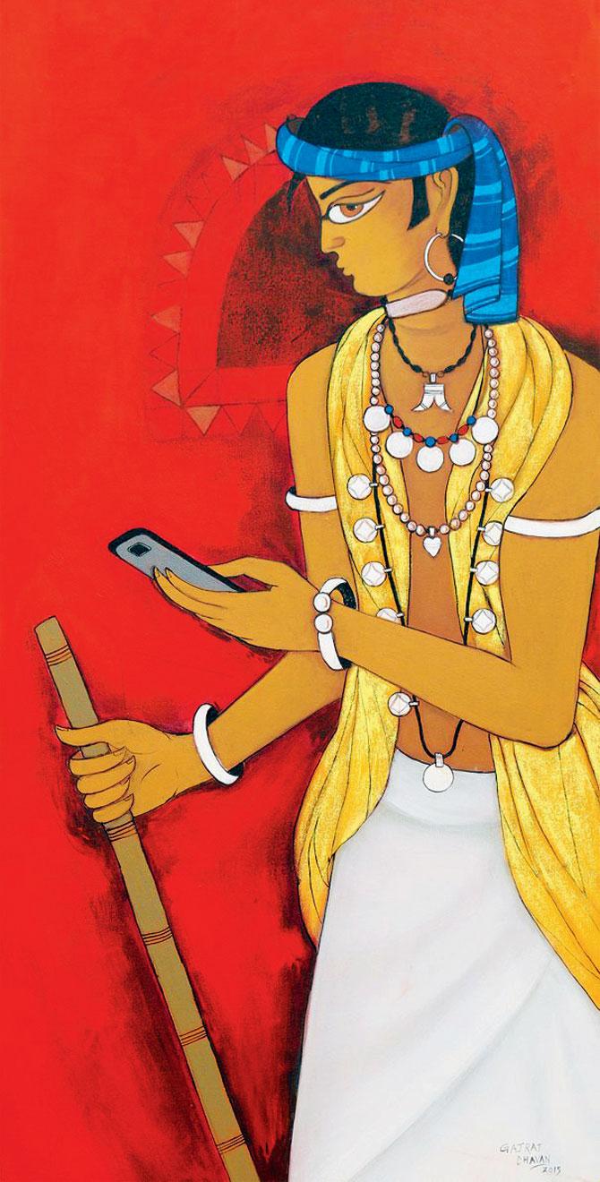 Tribal man with cellphone