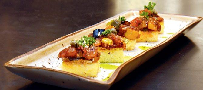 Grilled Polenta with Caponata won us over with its grainy texture and use of organic tomatoes