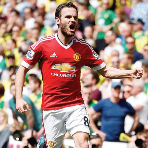 An ecstatic Juan Mata of Manchester United celebrates after scoring a goal during the English Premier League match against Norwich City at Carrow Road in Norwich on Saturday. pic/Getty Images