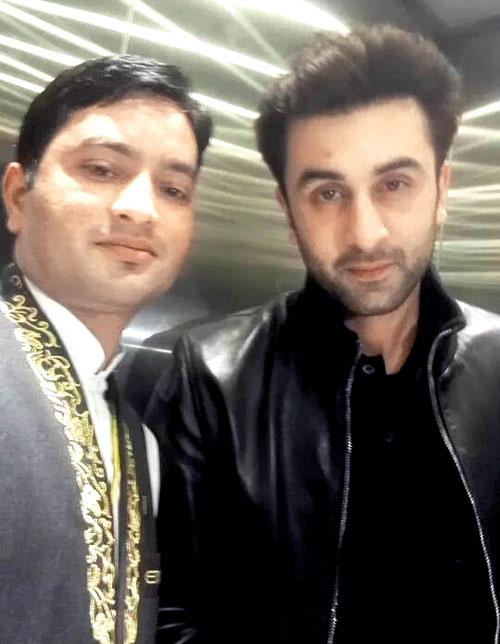 Ranbir Kapoor with a fan at the Abu Dhabi airport; (top) at a football match on Sunday
