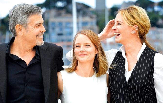 George Clooney, Jodie Foster and Julia Roberts. Pic/AFP