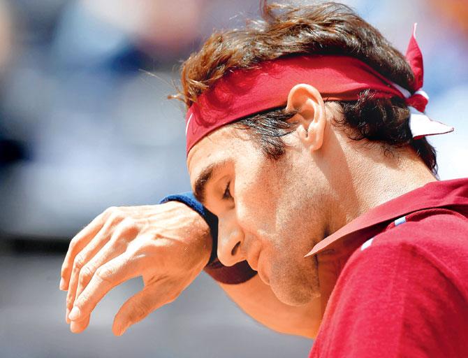 Roger Federer reacts during his third-round defeat to Austrian Dominic Thiem at the Rome Masters in Rome yesterday. Pic/AFP