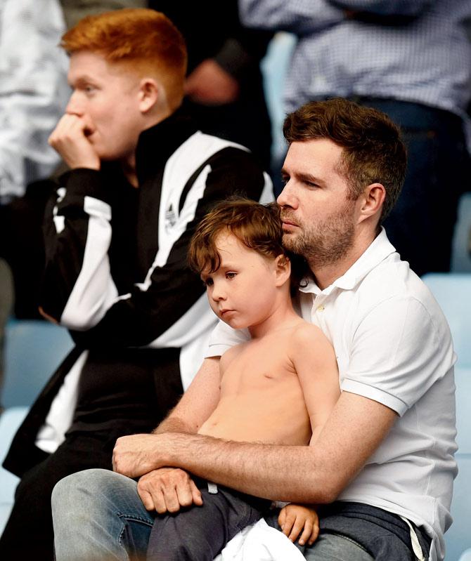 Newcastle United fans in a sombre mood during the EPL match against  Aston Villa in Birmingham on May 7. Pic/Getty Images