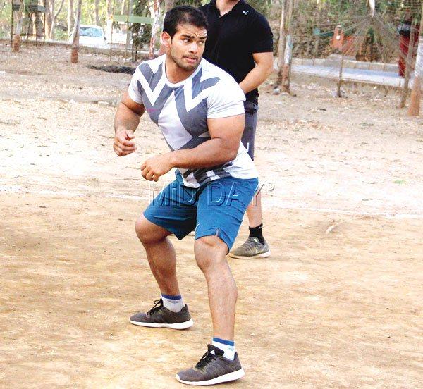 India’s freestyle wrestler Narsingh Yadav gets involved in a game of volleyball at the Sports Authority of India ground  in Kandivli on Saturday. PIC/AJINKYA SAWANT 