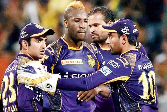 KKR players celebrate the fall of a Rising Pune Supergiants wicket in Kolkata on Saturday. Pic/PTI
