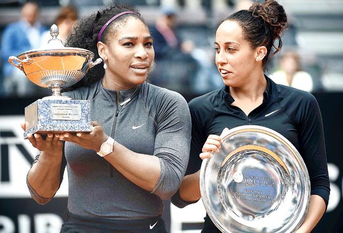 Winner Serena Williams (left) and Madison Keys pose with their trophies after the Rome Masters final in Rome yesterday. Pic/AFP