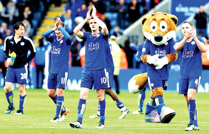 Leicester City players celebrate at the end of the EPL match against Swansea at the King Power Stadium in Leicester last Sunday. Pic/Getty Images 