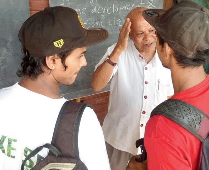Students interacting with locals while researching for the app, Chalk It Up