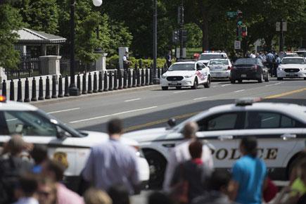 Man brandishing gun outside White House shot down