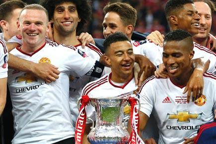 Man United's revenue tops a record half a billion pounds