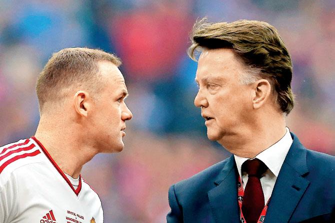 Manchester United’s Dutch manager Louis van Gaal (right) chats with captain Wayne Rooney ahead of the FA Cup final against Crystal Palace at Wembley Stadium in London on Saturday. PIC/AFP Both teams were tied 0-0 at half-time. 