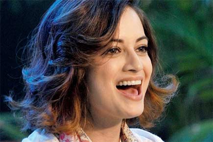 Dia Mirza caught by travelling bug