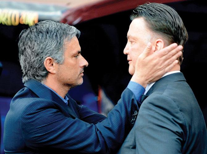 Jose Mourinho (left) is tipped to replace Louis van Gaal as Man United manager. Pic/AFP